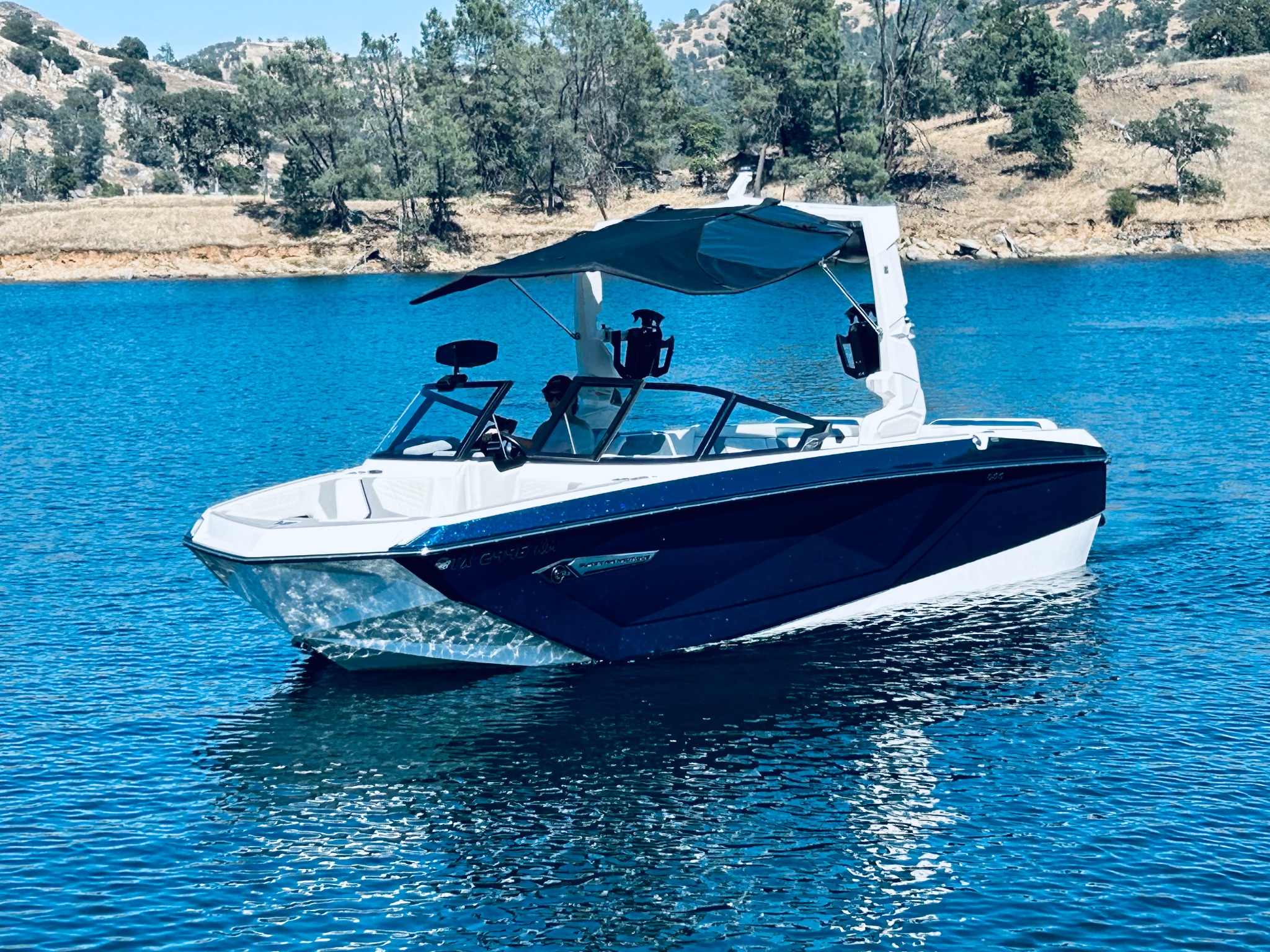 Premier Wake Co Nautique G23 on the lake